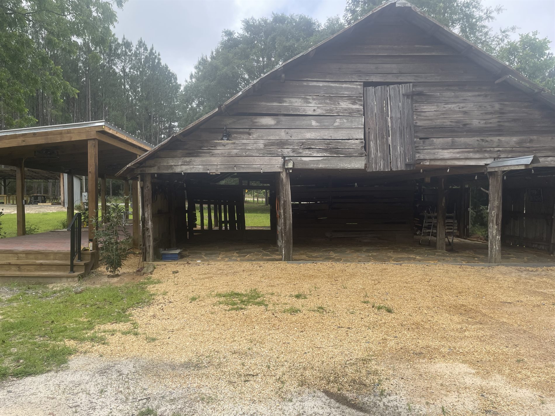 Historic barn front with flagstone floor for rustic event photos