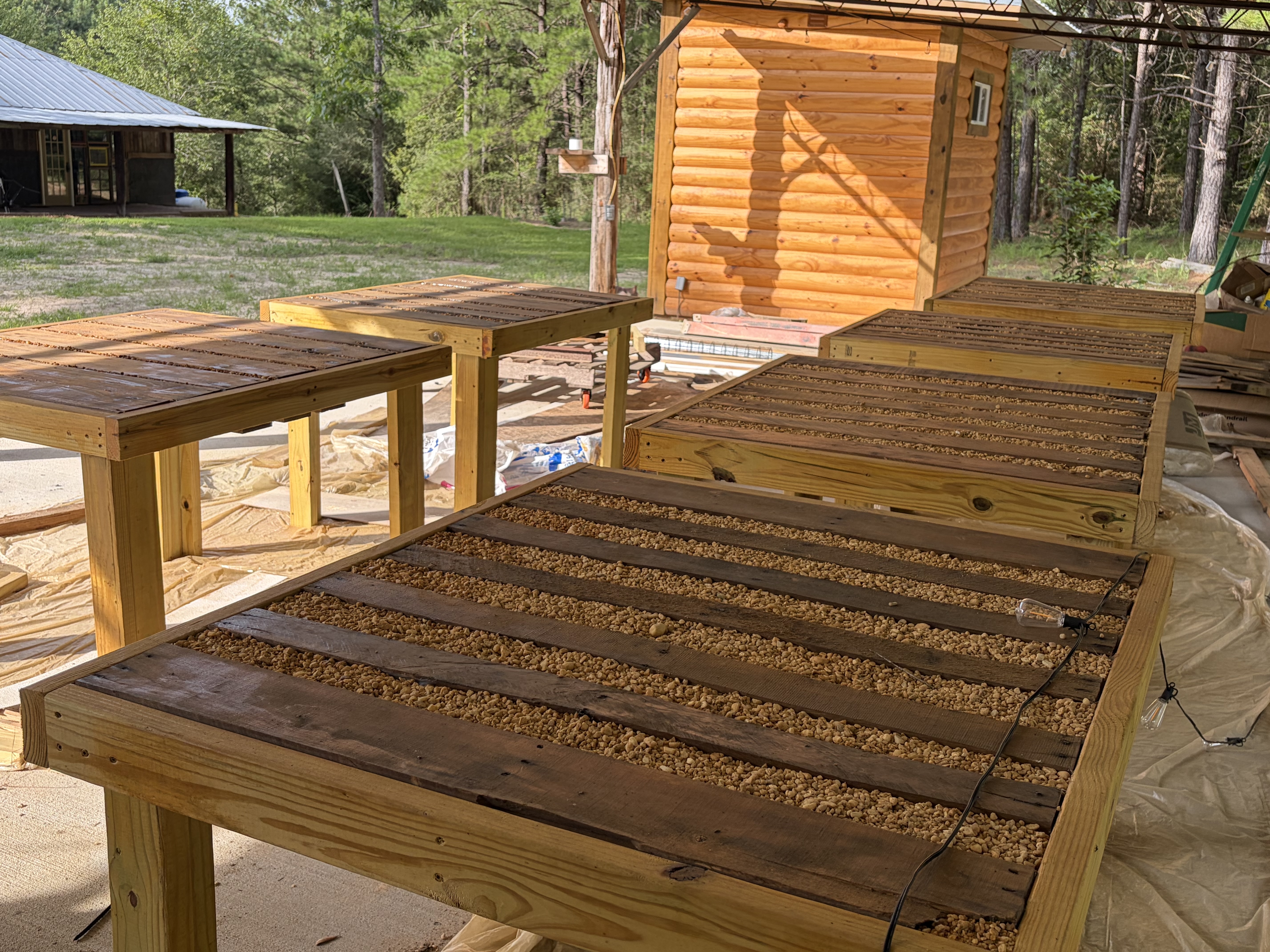 Custom outdoor pallet tables included with event package