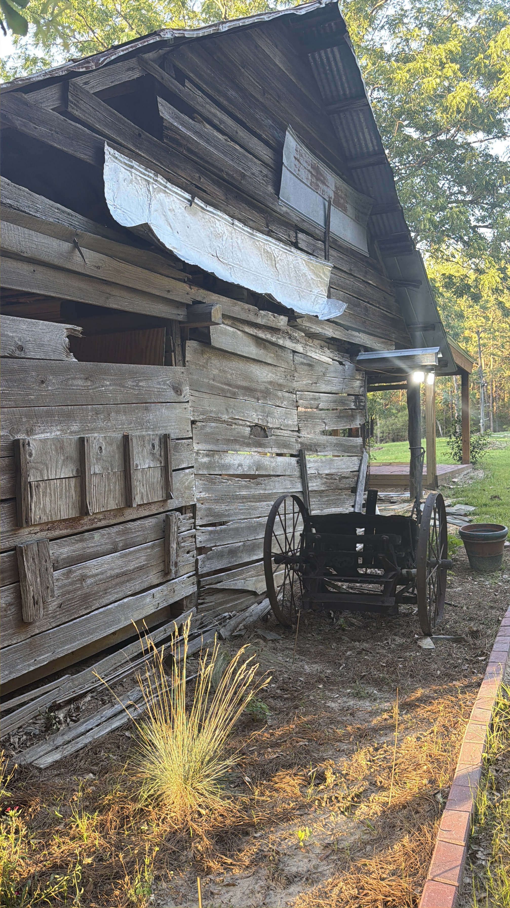 Historic barn exterior and rustic equipment detail